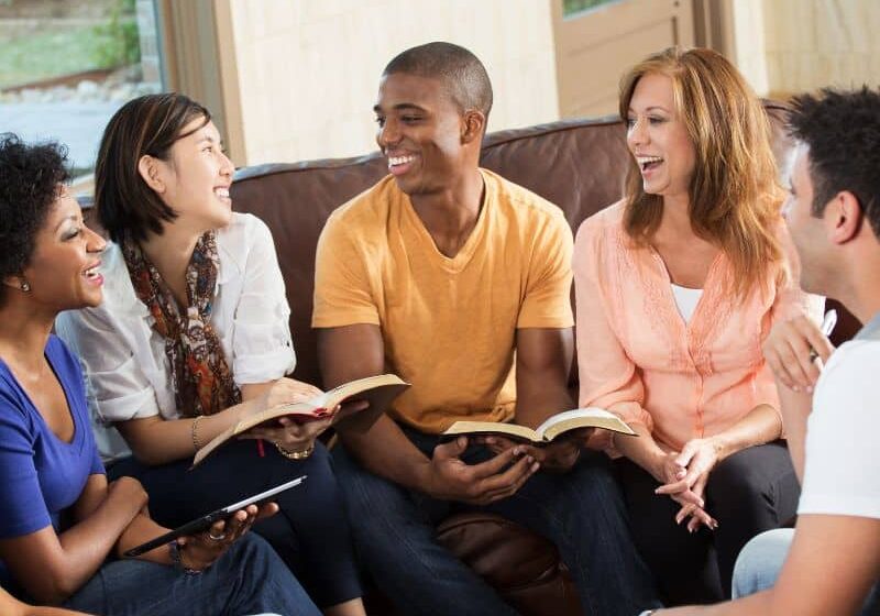 A picture of people doing Bible study together. EagleHub Christian communitry helps you grow in faith